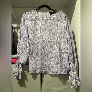 Long sleeve sheer snake pattern top